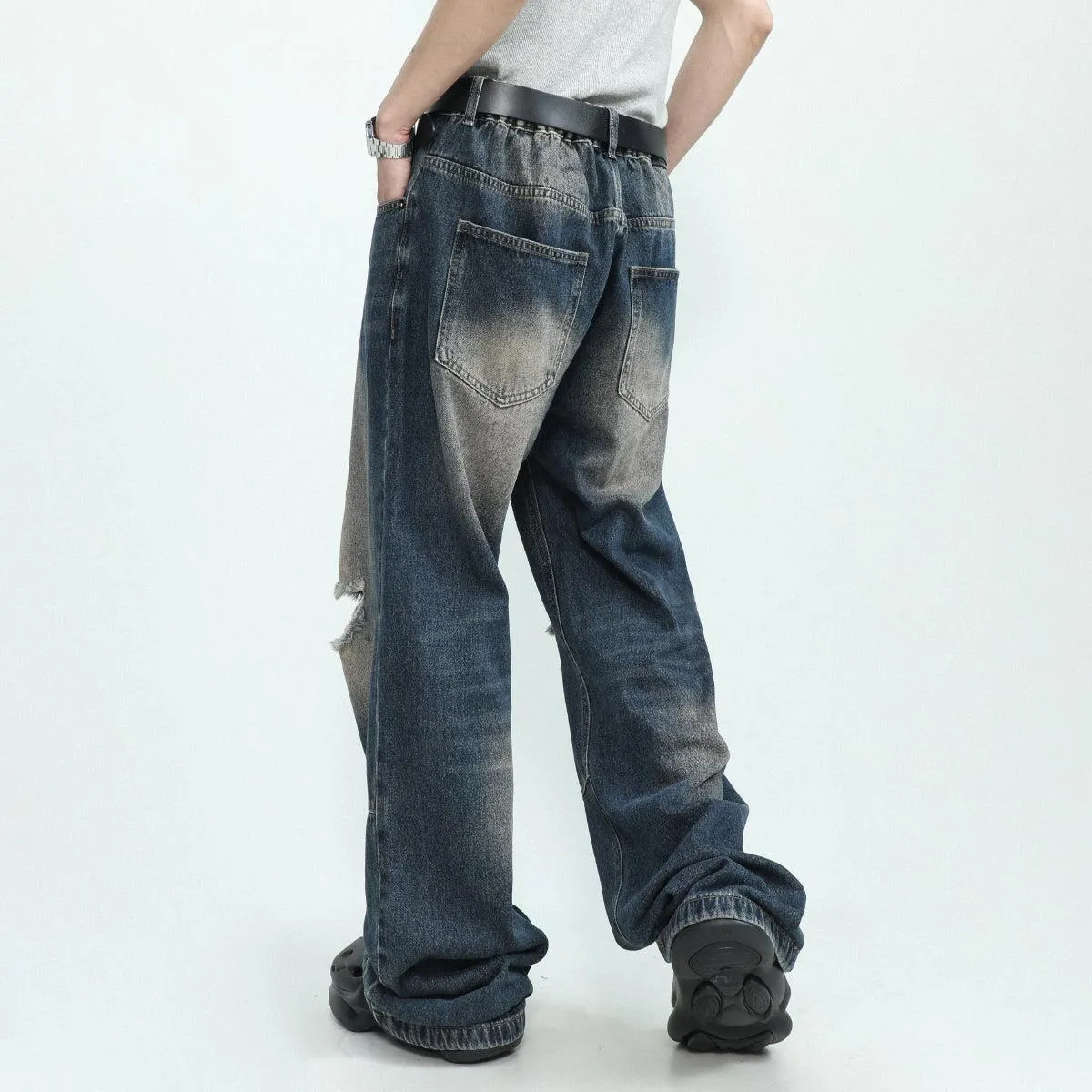 Ripped Knee Jeans